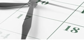 Immagine che rappresenta l'orario composta da un calendario con sovrapposto un orologio